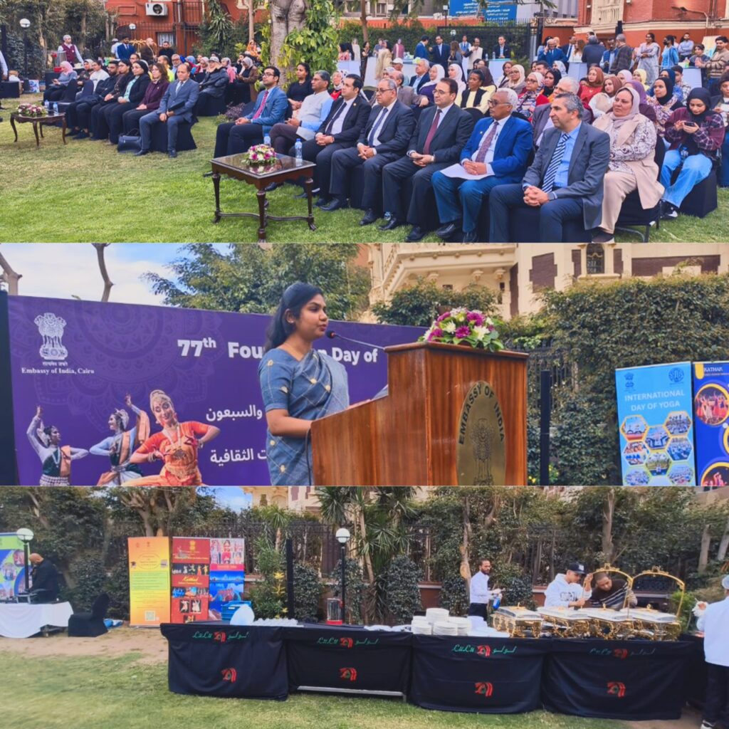 كولاج (تجميع) من ثلاث لقطات واسعة. اللقطة العلوية تظهر جمهوراً كبيراً جالساً على مقاعد سوداء في حديقة عشبية واسعة. اللقطة الوسطى تظهر سيدة  تلقي كلمة من خلف المنبر. اللقطة السفلية تظهر طاولة عشاء بوفيه مع مأكولات هندية شهيرة في الحديقة.