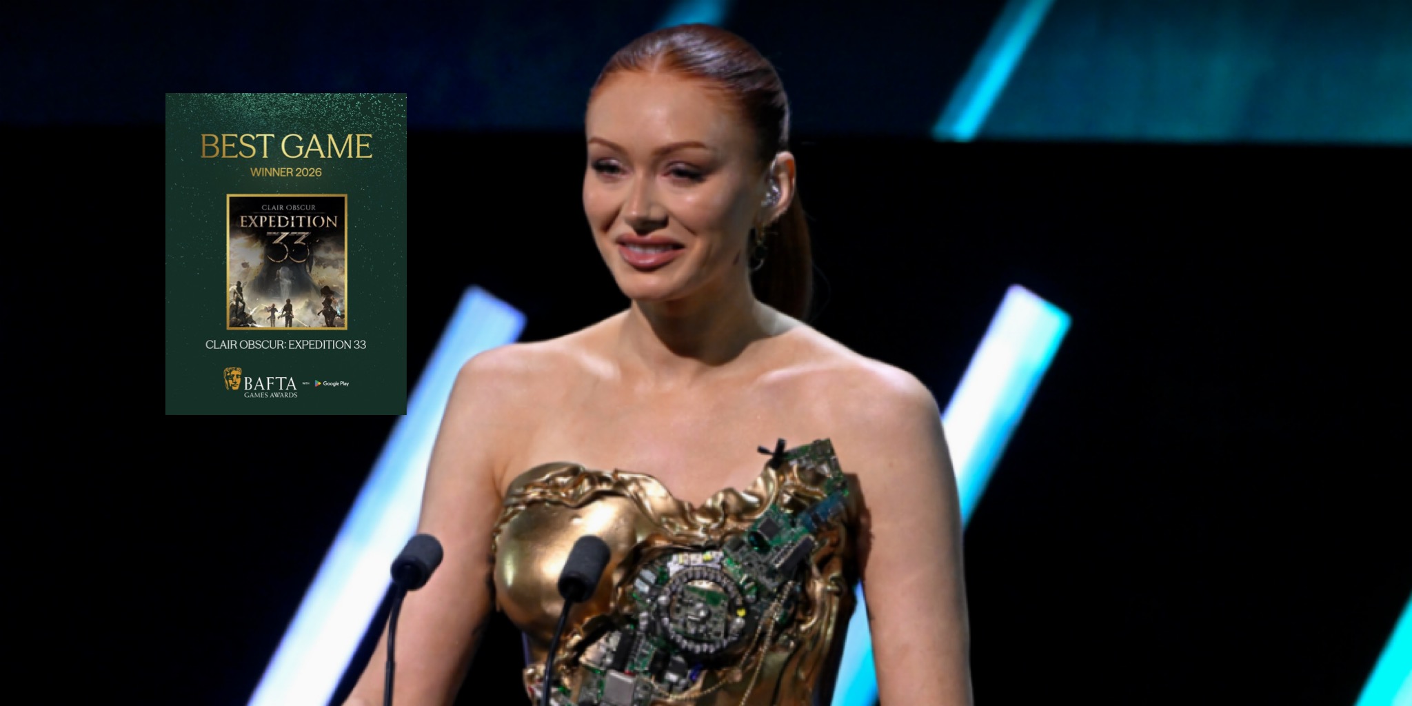 (Elz the Witch) مقدمة حفل BAFTA Games Awards 2026 على المنصة بفستانها الذهبي الميكانيكي مع شعار BAFTA وGoogle Play (صورة Stuart Wilson/BAFTA - Getty Images for BAFTA)